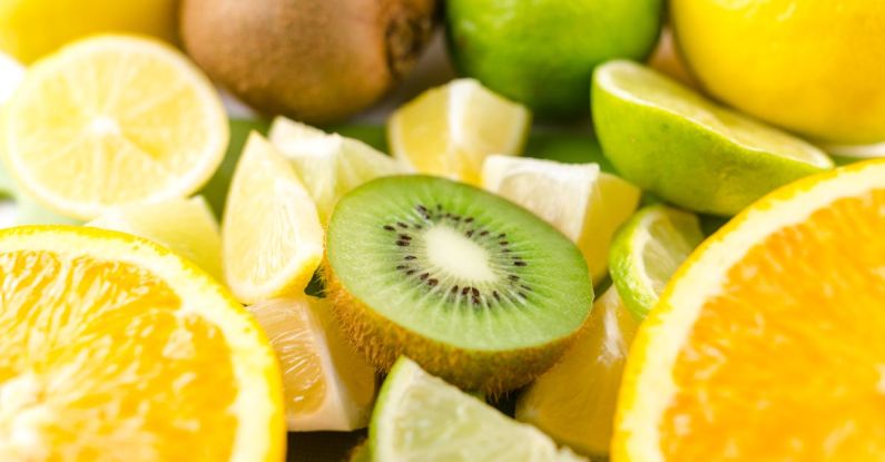 Vitamin C - Photo of Slices of Kiwi, Lime, and Orange Fruits