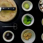 Ingredients - Spices on Bowl Near Knife on Chopping Boad