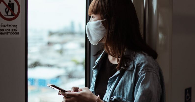 Masks - Woman Wearing a Face Mask on the Subway