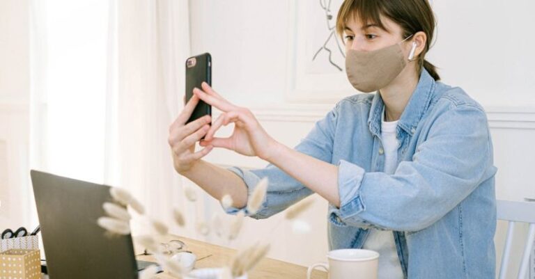 Masks - Woman in Face Mask Having Video Call